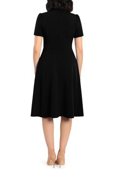 This dainty short sleeve dress is a retro inspired staple that's perfect for any well-dressed occasion. 45" length Necktie Short sleeves Back zip closure Lined 96% polyester, 4% spandex Hand wash, dry flat Imported Model Stats: 5'10" height; 34" bust; 27" waist; 35" hips. Fitted Midi Dress With Flattering Silhouette And Short Sleeves, Fitted Short Sleeve Knee-length Solid Dress, Fitted Solid Color Short Sleeve Knee-length Dress, Formal Short Sleeve Midi Dress With Flattering Silhouette, Formal Midi Dress With Flattering Silhouette And Short Sleeves, Short Sleeve Midi Dress With Flattering Silhouette For Evening, Evening Midi Dress With Flattering Silhouette And Short Sleeves, Midi Dress With Flattering Silhouette For Evening, Fitted Short Sleeve Midi Dress For Evening