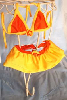 "Sunny, bright, beautiful bikini just waiting for your pup to show it off. Made out of swimwear material makes this one of a kind bikini very light and comfortable! Bikini can be worn tied to the back or front of your pup. Special price for set of bikini, towel and hat. Towel, Hat and bathing suit set available under our \"BATHING 3 PIECE SET \" section or click: www.etsy.com/listing/152817032/dog-bikini-orange-tangerine-3-piece-set Please use our \"SIZING * MEASURING * GUIDE\" under our SECTION Dog Swimming, Beach Clothes, Yellow Polka Dot, Dog Beach, Dog Dresses, Suit Set, Special Price, Pet Clothes, Beach Outfit