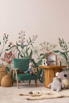 a living room with flowers painted on the wall and stuffed animals in front of it