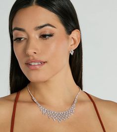 Radiate a stunning sparkle in this rhinestone necklace and earrings set perfect for your next black-tie affair! It features a gorgeously detailed collar necklace with a single row of rhinestones leading to two rows of rhinestones and a tiered asymmetric rhinestone design at the center. The short drop earrings feature a matching tiered asymmetric rhinestone design for a seamless chic look. Style this luxe set with a floor-sweeping formal dress and stiletto heels.Fit & FeaturesNecklace and ear Elegant Rhinestone Necklace With Diamond Accents For Evening, Elegant Rhinestone Jewelry Sets For Party, Elegant Rhinestone Jewelry Sets For Formal Occasions, Elegant Evening Jewelry Sets With Rhinestones, Sparkling Rose Gold Jewelry For Evening, Sparkling Rose Gold Evening Jewelry, Elegant Rose Gold Rhinestone Necklace For Party, Glamorous Crystal Jewelry Sets With Rhinestones, Glamorous Diamond Evening Jewelry Sets