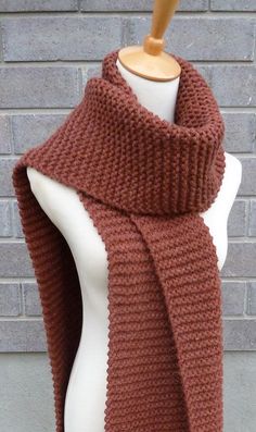 "This beautiful hand knitted scarf is made with chunky weight Wool Blend Yarn (80% Acrylic, 20% Wool). The pattern looks the same on both sides. The scarf can be worn in multiple ways. Very beautiful color. The color may appear slightly different on different monitors. Measures: 83\" (210 cm) long x 11\" (28 cm) wide. From a smoke-free home. Care instructions: Hand wash in cool water and dry flat." Red Crochet Scarf Pattern, Red Wool Scarf, Woolen Scarf, Hand Knitted Scarf, Bulky Knit, Woolen Scarves, Chunky Knit Scarves, Orange Scarf, Downtown Outfits