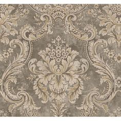 a beige and white wallpaper with an ornate design