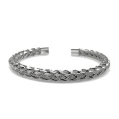 A unique piece of handmade jewelry that is super easy to put on and very comfortable You will love this amazing bracelet crafted from 5 small stainless steel wires braided in a spiral pattern. The smooth 1/4 inch wide braid is finished at each end with with rounded stainless steel caps to ensure nothing will catch on your clothes or scratch your skin. The round braid design makes the bracelet flexible which allows you to easily expand the opening while maintaining its shape. In total the length Boyfriend Bracelet, Silver Braided Bracelet, Round Braid, Wire Cuff Bracelet, Woven Metal, Bracelets For Boyfriend, Wire Cuff, Spiral Pattern, Metal Bracelet