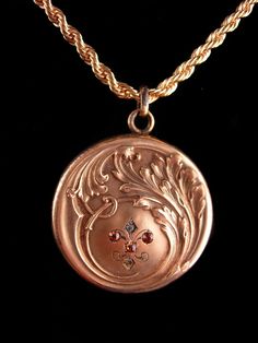 "This elegantly etched gold plate locket is on an 16\" vintage gold plate ( never worn) quality chain. The chain was added at a later date. . A victorian keepsake that has survived for well over 100 years. It closed and opens fine . 8-1-20" Vintage 14k Gold Locket Necklace, Vintage 14k Gold Locket Necklace Stamped 14k, Gold Medallion Locket Necklace Stamped 14k, Art Deco Jewelry With Vintage Charm For Vintage Events, Vintage Antique Gold Keepsake Necklace, Art Deco Vintage Charm Jewelry For Formal Occasions, Vintage Charm Art Deco Jewelry For Formal Occasions, Vintage Rose Gold Locket Necklace Gift, Vintage Rose Gold Locket Necklace For Gift