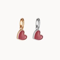 Each adorable Mini Red Heart Charm radiates warmth and affection. Perfect for Valentines Day and beyond, this charm can easily be added to most Merci Maman chains as an extra touch of love to every necklace.&nbsp;18K Champagne Gold Plated or 925 Sterling SilverCharm size: &nbsp;0.24 x 0.21Charms can be worn on all Merci Maman chain lengthsSent with love in a complimentary gift box Red Dangle Charm Necklaces, Red Pendant Charm Necklace, Valentine's Day Heart Charm, Valentine's Day Heart-shaped Open Heart Charms, Dangling Pendant Charms For Valentine's Day, Valentine's Day Heart Beads Charms With Heart Pendant, Valentine's Day Pendant Charms With Dangling Details, Valentine's Day Dangling Charms Pendant, Valentine's Day Heart Pendant Dangling Charms