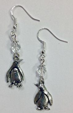 Penguin Charm earrings, also perfect for the Theta Phi Alpha sorority as the Penguin is the TPA mascot charm - the penguin charm is made of pewter, and is two sided (see the picture to see the front & the back of the charm) - a great charm for earrings! The accent beads are clear faceted crystal. On sterling silver earwires, comes with rubber stoppers, our exclusive design. Handmade in the USA. Alpha Car, Volleyball Jewelry, Penguin Earrings, Theta Phi Alpha, The Penguin, Faceted Crystal, Charm Earrings, Turquoise Stone, Sorority