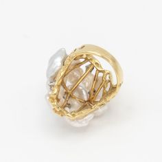 Vintage CELLINO Diamond Pearl cocktail ring with 6 Diamonds (G-H color / VS clarity) among 8 Baroque pearls, set in 18K yellow gold with cut out designs  Ring Size: 5.75  Approximate Weight: Gross - 13.50 grams Diamonds - 0.24 carat in total  Ring Top Measurement: 1.23" x 0.93"  Hallmarks: Cellino 18K Unique Luxury Hallmarked Pearl Ring, Vintage Hallmarked Pearl Ring, Vintage Gold And Platinum Cocktail Rings, Luxury Vintage Gold Pearl Ring, Pearl Cocktail Ring, Cut Out Design, Baroque Pearls, Cocktail Rings, Ring Designs