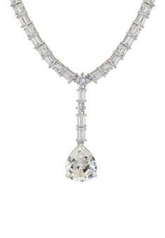 Discover the captivating allure of the Claudette Statement Necklace featuring Moissanite. This masterpiece, exquisitely crafted from 925 sterling silver, is the epitome of grace and sophistication. The necklace has a length of 46cm, with an additional 2.5cm drop that showcases a stunning lab-grown Moissanite teardrop gemstone, measuring 1.6cm in length and 1.2cm wide. The brilliance of Moissanite, known for its diamond-like properties, adds a touch of luxury and elegance. Adorned meticulously al Luxury Sterling Silver Teardrop Diamond Necklace, Luxury Bridal Necklace With Gemstones In Sterling Silver, Luxury Elegant Sterling Silver Custom Necklace, Luxury Silver Gemstone Bridal Necklace, Hamsa Hand Jewelry, Pink Tourmaline Jewelry, Sliver Necklace, Blue Topaz Jewelry, Mother Of Pearl Jewelry