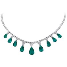 An Elegant Necklace Set with 9 Emeralds weighing 20.43 Carats and 17.74 Carats of Diamonds. Set in 18 Karat White Gold. Measures 16 inches. Complete Suite available, please inquire. 1stdibs Jewelry, Emerald And Diamond Necklace, Diamond Drop Pendant, Pear Shaped Diamond Ring, Emerald Necklace Pendant, Jewelry Emerald, Antique Necklaces, Sapphire And Diamond Earrings, Pear Cut Engagement Rings