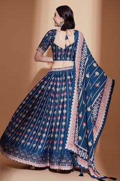 Elevate your style at your next wedding event with our digital print Lehenga Choli. The distinct digital print, fused with the fine craftsmanship of the Chinon fabric, gives it a unique yet elegant appeal. Designed keeping the latest fashion trends in mind, this Lehenga Choli adds a modern twist to traditional wedding wear. Comfort and style have never blended so beautifully before! Embroidered Lehenga, Wedding Wear, Lehenga Choli, Traditional Wedding, Intricate Details, V Shape, Beautiful Blue, Lehenga, Occasion Wear