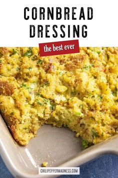 the best cornbread dressing recipe is in a casserole dish with a slice taken out