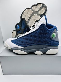 Introducing the Nike Air Jordan 13 Flint 2020 in size 11, style code 414571-404. This sneaker features a high top shoe shaft style with a synthetic upper material in a retro blue color theme. The sneaker has a standard shoe width and is part of the Air Jordan product line. Casual Air Max Basketball Sneakers, Air Jordan 4 High-top For Sports, Air Jordan 4 Mid-top For Sports, Casual Air Jordan 4 Breathable Mid-top Sneakers, Casual Air Jordan 4 Mid-top Breathable, Blue Breathable Lace-up Jordan Shoes, Air Jordan 4 High-top Synthetic Sneakers, Air Jordan 4 High-top With White Sole, Air Jordan 4 White Sole High-top Synthetic