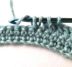 the crochet stitch is being worked on