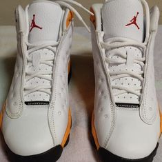 These Are Youth Air Jordon 13 Retro Never Worn Still In Box. Size 4.5 Youth 6 In Women White Jordan Shoes For Light Sports, White Jordan Shoes With Laces For Light Sports, White Mid-top Jordan Shoes With Laces, White Jordan Shoes For Sports With Round Toe, Basketball Shoes With White Laces, Jordan Gold, Air Jordan 13 Retro, Jordan 13 Retro, Shoes Air