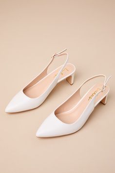 You'll instantly make any ensemble more sophisticated when you style it with the Lulus Bastienne White Pointed-Toe Slingback Pumps! Dress any look up with these smooth faux leather pumps that start with a classy pointed-toe upper that carries into a slender slingback strap that secures with a shiny gold buckle. A low blade heel lends an ultra-stylish finish to the chic design! 2. 25" blade heel. Lightly cushioned insole. Rubber sole has nonskid markings. All Man Made Materials. Imported. Lulus |