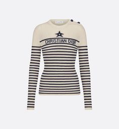 Part of the Dioriviera capsule collection, the cotton ribbed knit sweater is adorned with the timeless ecru and navy blue Dior Marinière motif. It showcases the House star symbol, as well as a jacquard Christian Dior signature. The style is distinguished by a round neck and button placket on the shoulder with anchor-engraved buttons. The sweater can complete other Dioriviera creations to complete the look.. 34 Blue Dior, Denim Swimsuit, Star Symbol, House Star, Dior Star, Christian Dior Couture, Short Denim, Dior Couture, Tuxedo Jacket