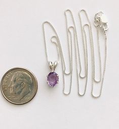 Genuine small oval amethyst measures 7x5mm (3/4 carat) and was handset in sterling silver. Sterling silver box chain is 18 inches long and can be switched out to a 16 inch chain upon request. Necklace is perfect for a child or the minimalist. Comes in a gift box Ruby Heart Necklace, Purple Stone Necklace, Smoky Quartz Jewelry, February Birthstone Necklace, Smoky Quartz Necklace, Smoky Quartz Pendant, Necklace Amethyst, Necklace Purple, Topaz Jewelry