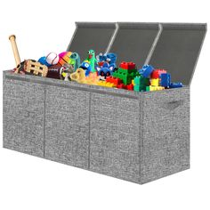 a toy storage box filled with lots of toys