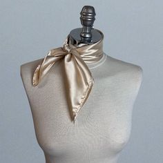 Simple and elegant neck scarf. Made of soft satin.  Color: beige (other colors are available) Size: 50 x 50 cm We have matching bags and other accessories in our Etsy Shop! We accept credit cards! Satin Silk Scarf Gift, Silk Scarves Perfect For Gifts, Elegant Silk Scarf With Satin Finish, Elegant Silk Square Scarves, Elegant Cream Scarf For Formal Occasions, Classic Satin Scarves As Gift, Chic Rectangular Silk Scarf As A Gift, Chic Rectangular Silk Scarf For Gifts, Elegant Square Scarves For Formal Occasions