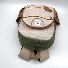 Introducing our handmade hemp backpack, a durable and eco-friendly option for carrying all your essentials. Crafted by skilled artisans, this backpack is made from high-quality hemp fiber and Heavy Duty Gheri Cotton fabric, known for its strength and durability. Not only is this backpack sturdy, but it also features a spacious interior with plenty of room for your laptop, books, and other daily necessities. The adjustable straps provide a comfortable fit, and the reinforced stitching ensures the backpack can withstand heavy use. But that's not all – our hemp backpack is also environmentally friendly. Hemp is a sustainable crop that requires minimal water and no pesticides, making it a popular choice for eco-conscious consumers. Plus, the backpack is handmade, so you can feel good knowing t Eco-friendly Travel Backpack, Eco-friendly Everyday Backpack In Natural Color, Eco-friendly Handmade Backpack, Eco-friendly Green Backpack For Daily Use, Eco-friendly Brown Backpack, Eco-friendly Green Standard Backpack, Eco-friendly Green Backpack, Hemp Backpack, Hemp Fiber