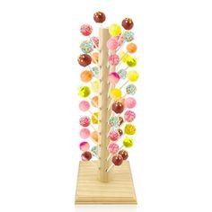 a wooden stand with lots of candies on it