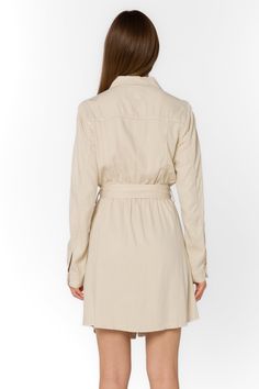 Add some sophistication to your wardrobe with the Deena Dress. This soft mini shirtdress features a stylish collar and snap button closure. With long sleeves and functional pockets, it's both practical and trendy. Complete the look with the self-belt for a flattering fit. Material: 60% Tencel™ and 40% Linen Machine wash cold or dry clean Color: Wheat Model is 5'9" and wearing a size S Imported Wheat Dress, The White Album, Shirtdress, New Tops, Jacket Sale, Xl Dress, Jacket Outfits, Sweater Jacket, Snap Button