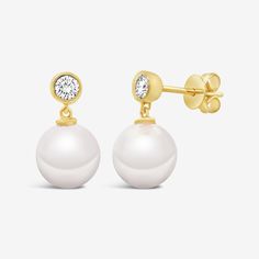 Add a touch of sheer elegance with our pearl drop earrings. The bezel-set round brilliant-cut diamond solitaire will catch the eye, while the pearl drop adds a classic touch. Handcrafted in 14K yellow or white gold, they are perfect for any occasion. Natural Freshwater Pearls: 8.5-9mm Natural Diamonds: 0.25ctw 14K Yellow or White Gold Length: 1/2 Inch Yellow Gold Diamond Earrings With Pearl Drop, Timeless Diamond White Pearl Drop Earrings, Timeless Diamond White Earrings With Pearl Drop, Yellow Gold Round Diamond Earrings With Pearl Drop, Gold Brilliant Cut Pearl Earrings, Formal Yellow Gold Diamond Earrings With Pearl Drop, Classic Pearl Earrings With Diamond Accents In Yellow Gold, Classic Yellow Gold Pearl Earrings With Diamond Accents, Classic Yellow Gold Pearl Earrings With Prong Setting