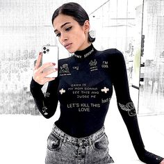 Brand New Boutique Item. Black Long Sleeve Bodysuit With A Turtleneck Neckline And A 3 Snap Button Closure At The Bottom. Features White Graphics Of Angels, Flames, Etc. & Words/Phrases Printed All Over Such As "Let's Kill This Love", “Turn Up Party”, “F**K This World” & “Enjoy The Game”. See Pictures For Details. Sexy, Stretchy & Form Fitting. Material: Polyester & Spandex Note: Runs Rather Small, I Recommend Buying 1 Size Up From Your Usual Size! Small: Bust: 29.9-33.8” Sleeve: 25.6” Waist: 23.6-25.9” Medium: Bust: 31.5-35.4” Sleeve: 25.9” Waist: 25.2-27.5” Large: Bust: 33-37” Sleeve: 26.4” Waist: 26.7-29.1” Casual Long Sleeve Graphic Bodysuit, Trendy Black Bodysuit For Club, Trendy Black Club Bodysuit, Black Fitted Punk Bodysuit, Fitted Black Punk Bodysuit, Black Graphic Print Bodysuit For Party, Trendy Graphic Print Stretch Bodysuit, Trendy Stretch Bodysuit With Graphic Print, Trendy Graphic Print Bodysuit For Party