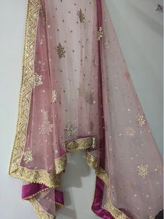 This Bridal Dupatta is sequin embroidered on net with beautiful golden border. This can be your wedding dress chunni for Indian occasion wear for festival. This has perfect bling for you to look classy and ethnic at same time. We can make in other colors.Pair it up with skirt and blouse from our shop.NOTE : There might be slight color variation due to different colour settings. Anarkali Dupatta With Mirror Work For Eid, Festive Anarkali Dupatta With Mirror Work, Gold Tissue Silk Anarkali Set With Sheer Dupatta, Gold Anarkali Set With Sheer Dupatta In Tissue Silk, Festive Semi-stitched Tissue Silk Dupatta, Festive Churidar With Sheer Chanderi Dupatta, Festival Dola Silk Anarkali Set With Sheer Dupatta, Dola Silk Anarkali Set With Sheer Dupatta For Festivals, Diwali Churidar With Sheer Dupatta And Chanderi Fabric