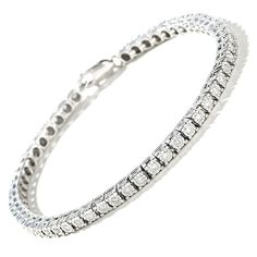 Illuminate her wrist with the lavish look of this classic 1 ct. t.w. diamond sterling silver tennis bracelet. Crafted in sterling silver Shimmering diamonds - each artfully set to enhance size and sparkle - line this classic design. Look great solo or layered with other bracelets Captivating with 1 ct. t.w. of diamonds This 7.0-inch bracelet secures with a lobster claw clasp. Silver Tennis Bracelet, Diamond Tennis Bracelet, Tennis Bracelet Diamond, Tennis Bracelet, Lobster Claw, Sterling Silver Bracelets, Classic Design, Tennis, Diamonds