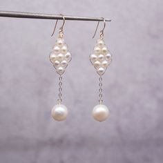 Elegant Pearl White Pearl Earrings As Gift, Akoya Pearl Dangle Earrings For Wedding, Pearl White Chandelier Earrings Made Of Pearl For Gifts, Elegant Pearl Chandelier Earrings As A Gift, Delicate Pearl Drop Chandelier Earrings As Gift, Akoya Pearl Drop Bridal Earrings As Gift, Delicate Pearl Drop Chandelier Earrings For Gifts, Hypoallergenic Akoya Pearl Earrings For Wedding, Graceful Pearl Dangle Earrings