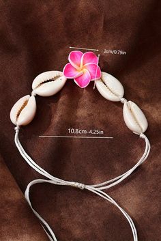 Experience the beauty of the ocean with our White Flower Seashell Adjustable Bracelet. Handcrafted with delicate white seashells, this bracelet adds a touch of elegance to any outfit. The adjustable design ensures a perfect fit for all. Bring a piece of the sea wherever you go. Flowers And Seashells, White Seashells, Push Up Lingerie, Ballroom Shoes, Dance Boots, Delicate Flowers, Pointed Toe Shoes, Beach Vibes, Delicate Flower