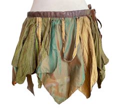 Bohemian Green Wrap Skirt For Festival, Green Bohemian Gathered Skirt, Bohemian Green Gathered Skirt, Green Patchwork Skirt For Festivals, Green Asymmetrical Skirt For Festival, Asymmetrical Green Skirt For Festival, Bohemian Asymmetrical Gathered Skirt, Green Bohemian Asymmetrical Skirt, Peter Pan Costumes