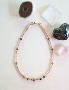 Various Unakite gemstones, pink and green jade, glass crystal beads, with pink and gold glass seed beads. Gold filled claps closure. 12 INCHES Pink Beaded Necklace, Bracelet Craft, Bracelet Craft Diy, Beads Bracelet Design, Bracelet Design, Teardrop Beads, Glass Seed Beads, Bead Patterns, Bracelet Crafts