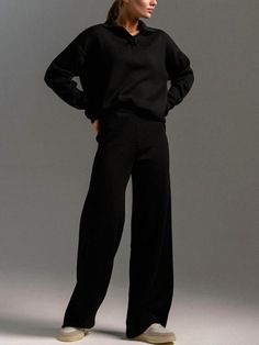 Upgrade your fall wardrobe with our cozy Black Long Sleeve Knit Sweater and Pants Set. Perfect for any occasion, whether it's traveling or lounging at home. Stay comfortable and stylish with this must-have set. Made with high-quality, warm materials to keep you comfortable all day long. 50% Viscose30% Polyester20% Nylon Versatile Wide-leg Sweatpants For Fall, Black Wide-leg Lounging Pants, Relaxed Fall Sweats For Loungewear, Versatile Solid Color Sweatpants For Fall, Solid Sweatpants For Workwear In Fall, Relaxed Fall Loungewear Sweats, Relaxed Full Length Sweatpants For Fall, Cozy Black Sweatpants For Loungewear, Relaxed Full-length Sweatpants For Fall