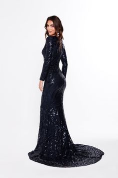 The Julieta is an elegant long sleeve sequins gown. It is made with beautiful geometric fabric and has a lot of stretch to it. The features on this gown are an elegant v neckline, long sleeve and a small mermaid train. The material is quite stretchy and there is an exposed back zipper. What is a Made-To-Order? This product is a made-to-order item. Made-to-order items are not held in physical stock and production commences AFTER order placement. We try to limit production and stock levels and as Long Sleeve Embellished Maxi Dress For Formal Events, Embellished Long Sleeve Maxi Dress For Formal Events, Embellished Long Sleeve Maxi Dress For Formal Occasions, Embellished Long Sleeve Maxi Dress For Gala, Gala Maxi Gown With Contrast Sequin, Fall Party Maxi Gown, Glamorous Long Sleeve Embellished Maxi Dress, Elegant Long Sleeve Gown With Contrast Sequin, Formal Gown With Contrast Sequin And Long Sleeves