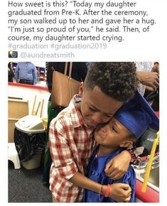 a little boy hugging his dad in the middle of graduation