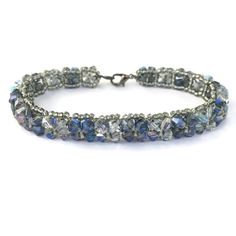 A Handmade Bracelet Woven With Two Shades Of Blue Gray Glass Crystals. One Shade Is Darker Than The Other, And They Shimmer With Iridescent Rainbow Blues. Accented With Dark Grey Metallic Seed Beads. Made With Extra Strong Beading Thread For Durability. Measures Approximately 7.5 Inches, But Can Be Made Any Length At Your Request. Not Intended For Children Under 12. Elegant Blue Beaded Nickel-free Bracelets, Blue Nickel-free Crystal Bracelet Gift, Bohemian Blue Multi-strand Beaded Bracelets, Elegant Sapphire Colored Hand-strung Beaded Bracelets, Floral Cuff Bracelet, Prayer Bead Bracelet, Mixed Metal Bracelets, Bohemian Blue Hand-strung Crystal Bracelet, Dangle Bracelet