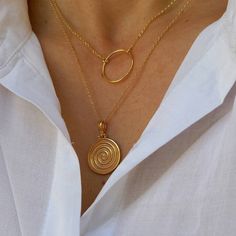 14k gold-filled floating necklace with an eye-catching Ancient Greek Spiral Pendant hanging on high quality 14k gold filled chain. Dainty everyday necklace. Ancient Greek Spiral is a symbol of infinity, of constant motion. Ideal gift! Complete the set: https://www.etsy.com/listing/1104147517/spiral-bracelet-bracelet-in-14k-gold?click_key=7ef248893cbaf975dd7625d86705068a8dbea0d2%3A1104147517&click_sum=afbaa32d&ref=shop_home_active_8&pro=1&frs=1 https://www.etsy.com/listing/1249712854/spiral-ring- Handmade Spiral Yellow Gold Jewelry, Gold Spiral Jewelry, Minimalist Gold Spiral Jewelry, Gold Plated Spiral Jewelry, Spiral Gold-plated Jewelry, Spiral Yellow Gold Necklace For Gift, Gold Spiral Necklace As A Gift, Gold Spiral Necklace For Gifts, Gold Spiral Necklace For Gift