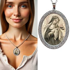 Experience the protective embrace and historical beauty of Saint Rose of Lima with our "Vintage Elegance Necklace." Exclusively available at Maria Santissima Shop, this radiant piece is a celebration of faith, intricately designed with rhodium, glinting cubic zirconia, and a vintage-style image of the saint, safeguarded under a glass cover. This necklace is an embodiment of Saint Rose's spirit, revered as the Patroness of Latin America and the gentle caretaker of gardeners, embroiderers, and flo Antique Miraculous Medal Necklace As Gift, Vintage Miraculous Medal Necklace As Gift, Silver Necklace With Miraculous Medal For Wedding, Vintage Miraculous Medal Necklace Gift, Vintage Silver Necklaces For Memorial, Victorian Jewelry With Miraculous Medal For Gifts, Vintage Necklace With Round Miraculous Medal, Vintage Round Miraculous Medal Necklace, Vintage Round Necklace With Miraculous Medal