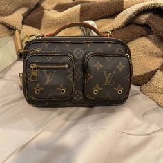 This Item Is In Excellent/Like New Condition. I Used It About 3 Times. I Purchased In 2022, I Do Have The Receipt, Dust Bag And Box. Posh With Authenticate, So No I Will Not Send Or Post The Receipt. However, I Will Send Along With The Box And Dust Bag When Purchased. This Particular Bag Is Made In Italy, And Comes With The Strap And The Coin Purse! It’s Sooo Gorgeous ;) And 100% Authentic Monogram Canvas Crossbody Bag With Branded Hardware, Monogram Canvas Belt Bag With Detachable Strap, Monogram Canvas Crossbody Belt Bag For Travel, Designer Monogram Canvas Crossbody Belt Bag, Everyday Monogram Canvas Crossbody Belt Bag, Brown Monogram Canvas Crossbody Belt Bag, Designer Belt Bag With Gold-tone Hardware For Travel, Brown Monogram Canvas Belt Bag For Everyday Use, Brown Monogram Canvas Belt Bag With Gold-tone Hardware