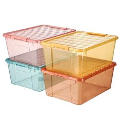 three plastic storage containers with lids and dividers on the top one is orange, pink, and blue