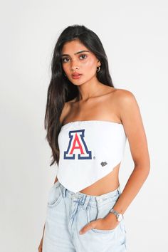 Our Bandana Top is the perfect trendy piece to complete your game day fit! Features a strapless, cropped silhouette with a ruched, elastic back and pointed bottom hem. SIZING AND DETAILS Sizing: XS-XXL Adjustable back ties 95% Cotton, 5% Spandex Heat Transfer Vinyl logo application P.S. We’d love to see you repping this style! Make sure to tag us (@hypeandvice) to be featured :) Vinyl Logo, Bandana Top, Logo Application, Transfer Vinyl, Heat Transfer Vinyl, Game Day, Heat Transfer, See You, Arizona