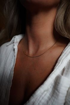 Model wearing INDIVIJWL 16-inch dainty gold box chain necklace, featuring a delicate 24k gold-filled design. Perfect for a minimalist, elegant jewelry style. Everyday Curb Chain Charm Necklace, Everyday Rose Gold Curb Chain Necklace, Everyday Rose Gold Necklace With Curb Chain, Simple Everyday Yellow Gold Chain Necklace, Everyday Rose Gold Necklace With Box Chain, Everyday Rose Gold Box Chain Necklace, Delicate Rose Gold Box Chain Necklace, Dainty Charm Necklace With Box Chain, Dainty Rose Gold Necklace With Box Chain