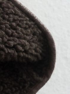 a close up view of the inside of an animal's wooly coat, which is very soft