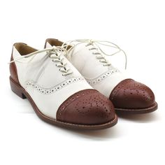 This classic cap toe oxford is good for strolling down the avenue and gliding around the dance floor. It features classic natural leather welts with contrast stitching. All leather construction with leather soles Whole and half sizes, 6 ½-13 Imported Sizing Generally fits true to size, but runs a bit narrower than our Fitted Oxfords With Leather Sole, Leather Cap Toe Oxfords For Fall, Fitted Almond Toe Derby Shoes, Fitted Brown Cap Toe Oxfords, Fitted Round Toe Oxford For Derby, Fitted Round Toe Oxfords For Derby, Fitted Almond Toe Derby Oxford Shoes, Fitted Almond Toe Derby Shoes In Oxford, Fitted Oxford Derby Shoes With Almond Toe