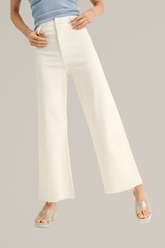 upgrade your casual wardrobe with these zara-dupe, cream wide-leg cut-off denim pants, a versatile blend of comfort and contemporary style. crafted from premium denim with stretch, these pants feature a flattering high-rise waist and a wide-leg silhouette that offers a relaxed, yet chic look. pairs effortlessly with both casual tees and dressier tops. finished with a cut-off hem for a modern edge, these pants are ideal for creating effortless day-to-night outfits. 98% cotton | 2% spandex back po Casual Tees, Dressy Tops, Romper With Skirt, Casual Tee, Premium Denim, Night Outfits, Dress Romper, Casual Wardrobe, Hat Hairstyles