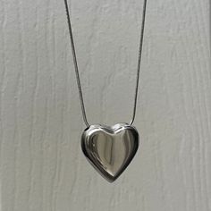 "Puffed Big Heart Necklace in Silver ✨⛓ Fully stainless steel & tarnish proof! 16\" with an extender for adjustability  Snake chain style featuring a silver/chrome puffed heart pendant 🤍 Handmade with love!" Chrome Necklace, Big Heart Necklace, Suede Cord Necklace, Puffy Heart Charms, Silver Heart Earrings, Sterling Silver Heart Pendant, Romantic Jewellery, Silver Chrome, Puffed Heart