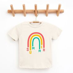 Looking for a cute tee for your kids? We have the perfect Rainbow Summer graphic tee addition to their closet! Also available in toddler tees. Casual Letter Print T-shirt For Playtime, Cute Letter Print T-shirt For Playtime, Trendy Spring Playtime T-shirt, Screen Print Short Sleeve T-shirt For Playtime, Playful Short Sleeve T-shirt With Text Print, Summer Playtime Tops With Letter Print, Summer Cotton T-shirt For Playtime, Cotton T-shirt For Summer Playtime, Playful Short Sleeve T-shirt With Letter Print