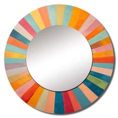 a round mirror with multicolored strips on it's sides and a white background